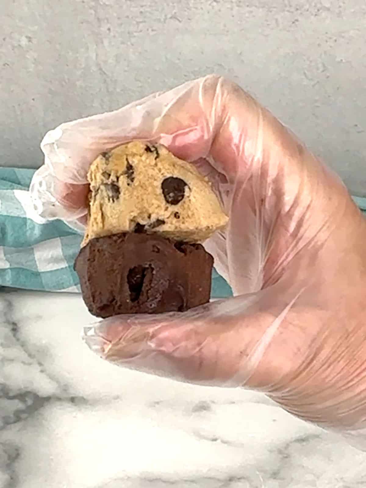 pressing the two types of dough together