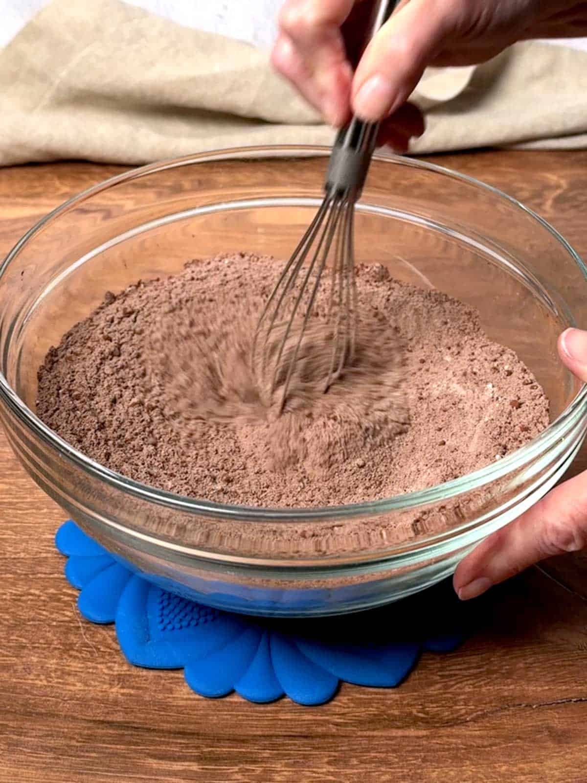 Whisking together the dry ingredients for the chocolate cake.
